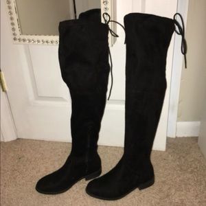 Thigh high black boots